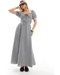 esmé studios - Vestido Playero Largo A Cuadros Vichy Negros Y Blancos Con Lazada Delantera Y Mangas Abullonadas Exclusivo De Esmee - Lyst