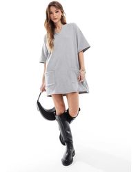ASOS - Ruimvallende Geribbelde Oversized Mini T-Shirtjurk Met Zakken - Lyst