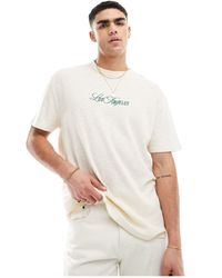 ASOS - T-shirt décontracté en tissu texturé avec imprimé ville sur la poitrine - Lyst