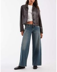 Hollister - Ultra Low Rise baggy Fit Jeans With Embroidery Detail - Lyst