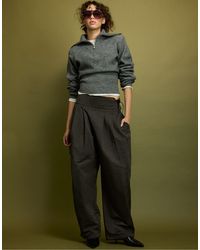 Stradivarius - Strickpullover mit gepolsterten schultern und kurzem reißverschluss - Lyst