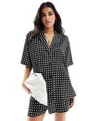 ASOS - Chemise d'ensemble à pois en satin avec col à revers - noir et blanc - Lyst
