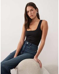 GOOD AMERICAN - Sculpting Modern Tank Bodysuit - Lyst