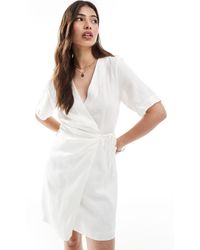 & Other Stories - Robe portefeuille courte en lin - Lyst