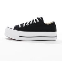 Converse - Chuck taylor all star lift ox - baskets larges à semelle plateforme compensée - Lyst