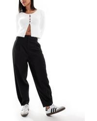 ASOS - Elegante Broek Met Wijde Ronde Pijpen En Knoop Op De Zoom - Lyst