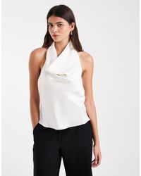 Vero Moda - Top sans manches à col halter en satin crème - Lyst