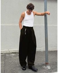 Bershka - Pleated semi-jogger Super baggy Trousers - Lyst