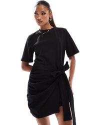 In The Style - Wrap Tie Side Mini T-shirt Dress - Lyst
