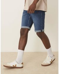 Calvin Klein - Short slim en jean avec ourlets à revers - délavage foncé - Lyst