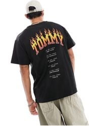 Tommy Hilfiger - T-shirt nera comoda con stampa vintage con fiamme - Lyst