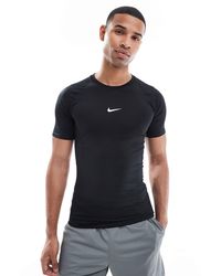 Nike - T-Shirt Pro Dri-FIT Kurzarm-Fitness-Oberteil schwarz/weiß - Lyst