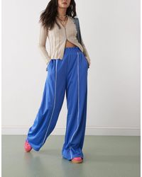 Monki - Wide Leg Pull On Track Pant With Piping - Lyst