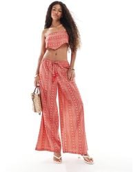 Wednesday's Girl - Pantaloni Da Mare A Fondo Ampio Rossi Con Stampa Fantasia - Lyst