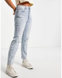 Stradivarius - – schmal geschnittene, verkürzte mom-jeans aus baumwolle - Lyst