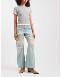 Levi's - Losse Bootcut Denim Jeans Met Scheuren - Lyst
