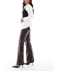 ASOS - Minimalistische Elegante Flare-Broek Van Imitatieleer Met Slangenprint - Lyst