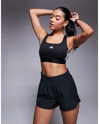 adidas Originals - Adidas Training Hyperglam Mid Support Sports Bra - Lyst