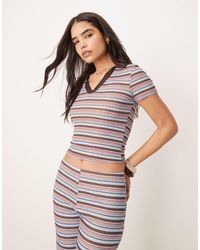 ASOS - Top d'ensemble style rugby à col polo coupe rétrécie - bleu et marron rayé - Lyst