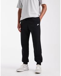 Nike - Club Cuffed Fleece joggers - Lyst