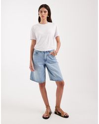 Vero Moda - Pantalones Cortos Vaqueros Azul Claro De Pernera Ancha Y Corte Alargado De - Lyst