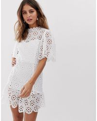 lioness high neck cutwork lace mini skater dress