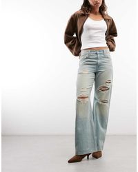 Levi's - Middy Loose Boot Jeans With Rips - Lyst