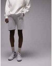 TOPMAN - Pantalones cortos color piedra lavado y diseño bordado paris - Lyst