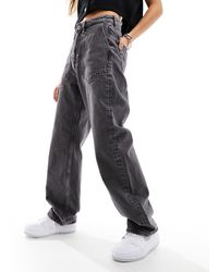 ONLY - Carrie - jeans con fondo ampio a vita alta slavato - Lyst