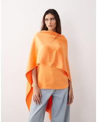ARRANGE - Satin Underlay Cape Top - Lyst