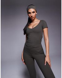 4505 - Icon Soft Touch V Neck Performance Baby T-Shirt - Lyst