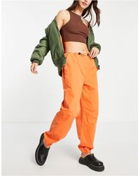 Orange Cargo pants for Women | Lyst