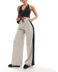 Reclaimed (vintage) - Pantalones sin cierres con banda lateral y detalle - Lyst