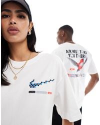 Nike - Air - t-shirt avec motif oiseau au dos - blanc - Lyst