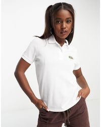 Lacoste - X stranger things - polo bianca con logo - Lyst