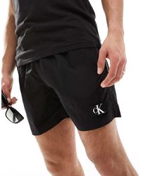 Calvin Klein - Monogram Logo Nylon Swim Shorts - Lyst