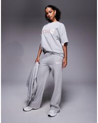 Kaiia - Cotton Rich Embroidered Logo Wide Leg Sweatpants - Lyst
