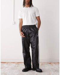 adidas Originals - – adidas x jeremy scott – weite hose aus kunstleder - Lyst