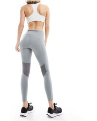 Nike - Fast - legging en tissu dri-fit à taille mi-haute - gris fumée - Lyst