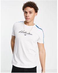 Camisetas y polos Hollister de hombre: hasta el 59 % de descuento | Lyst