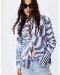 Stradivarius - – gestreifte basic-hemdbluse aus popeline - Lyst