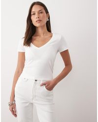 GOOD AMERICAN - Baby Tee Met V-Hals - Lyst