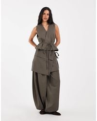 Muse Assembly - Hose mit bindedetail - Lyst