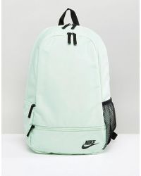 mint green nike backpack