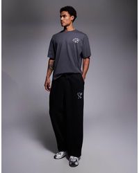ADPT - Loose Fit joggers With Star Logo - Lyst