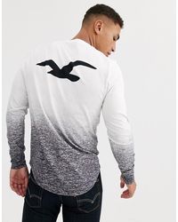 adidas Synthetik Langarmshirt mit Kontraststreifen in Weiß adidas Synthetik Langarmshirt mit Kontraststreifen in Weiß