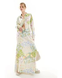 ASOS - Falda larga con lazada en la cintura y estampado floral variado spun - Lyst