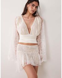 I.AM.GIA - Stevie Lace Ruffle Dropped Waist Asymmetric Detail Mini Skirt - Lyst