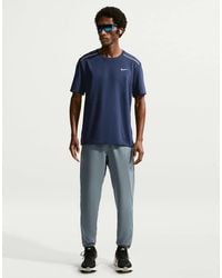 Nike - Miler Dri-Fit Woven Trousers - Lyst