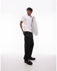 Carhartt - Pantalones Negros Con Estampado Gráfico En La Parte Delantera Og Single Knee De - Lyst